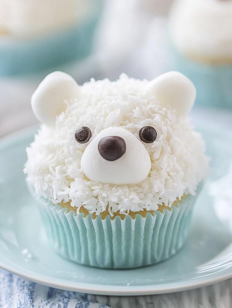 Cute and Fluffy Polar Bear Cupcake on a Blue Plate